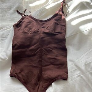 Brown Bodysuit with Low-Cut Neckline and High-Cut Leg Openings